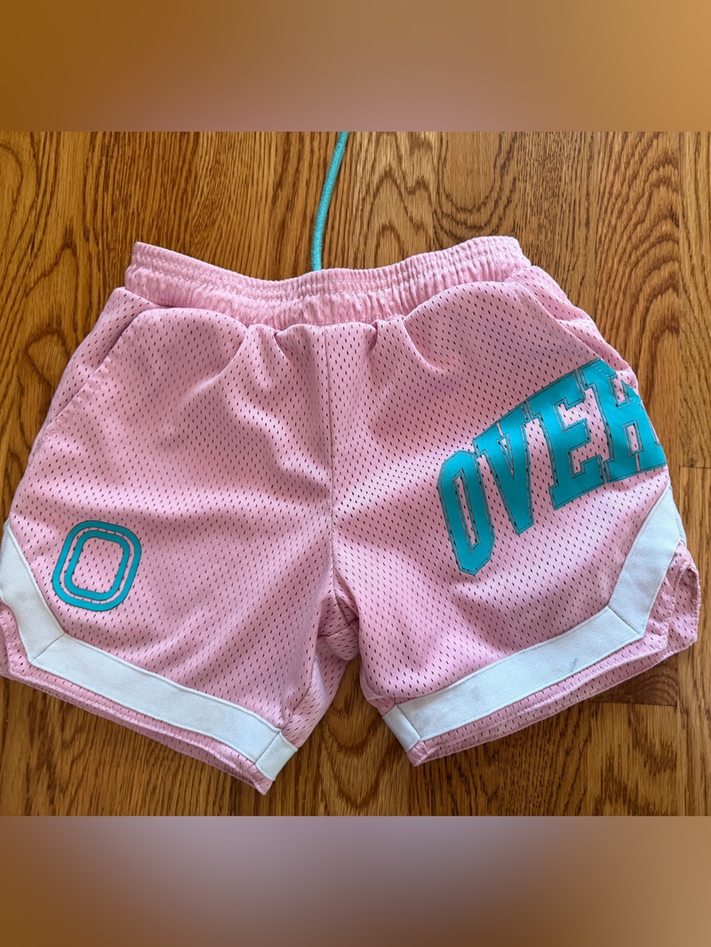 Girls' Pink Mesh Athletic Shorts with Teal Graphic